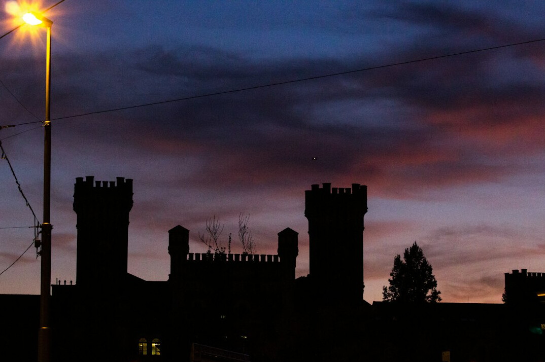 old stone castle at dusk