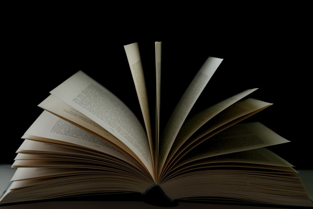 open book with mystery plot