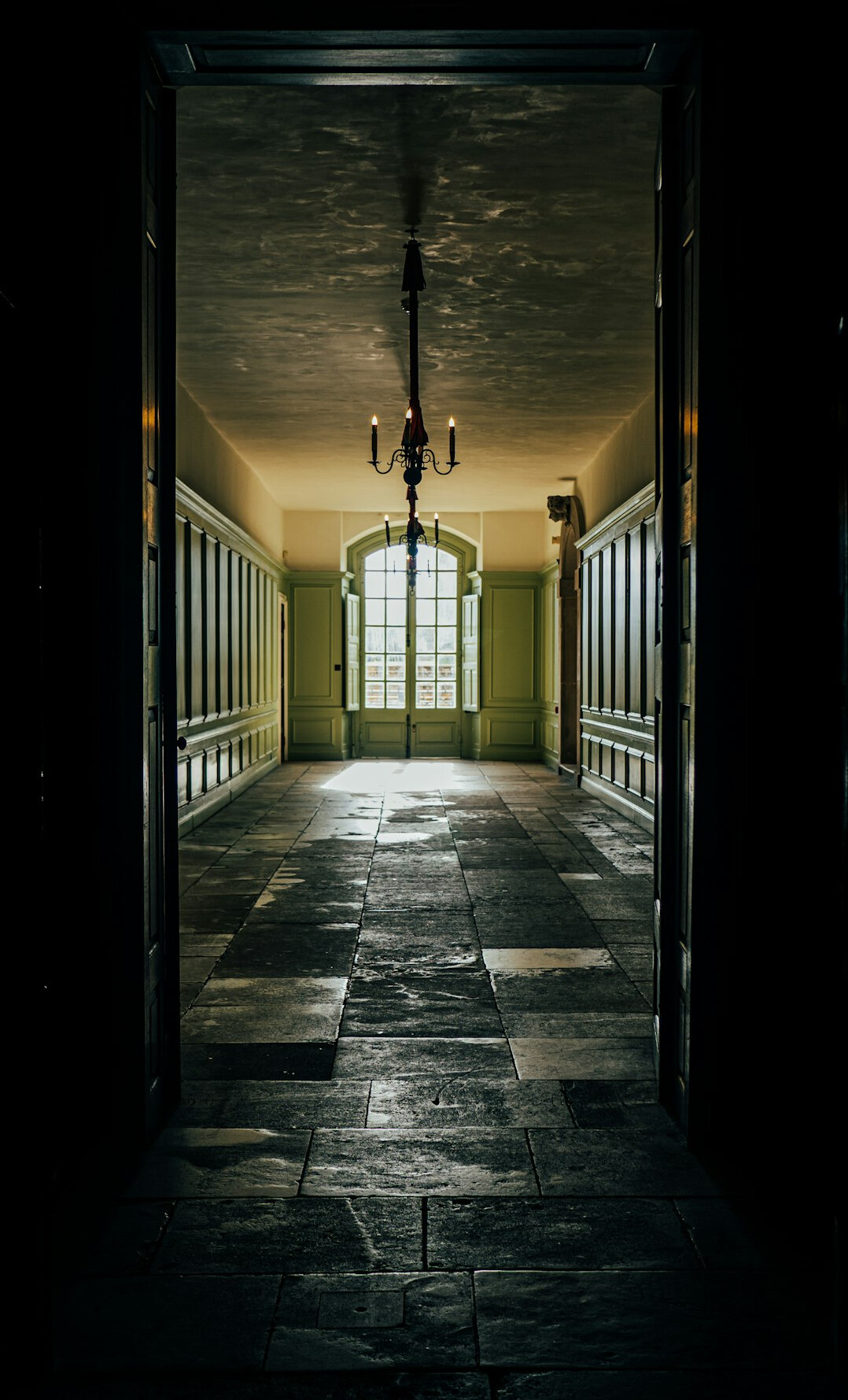 closed wooden door in hallway